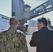 Principal Deputy Director of SOFA Division, North American Affairs Bureau, Ministry of Foreign Affairs of Japan visits USS Germantown
