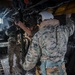 Marines fast-rope onto the USS Kearsarge