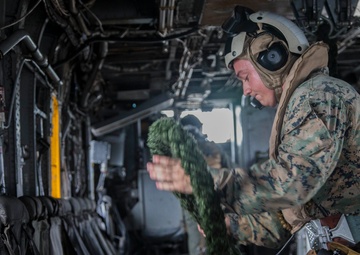 Marines fast-rope onto the USS Kearsarge