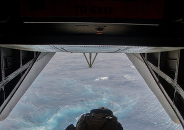 Marines fast-rope onto the USS Kearsarge