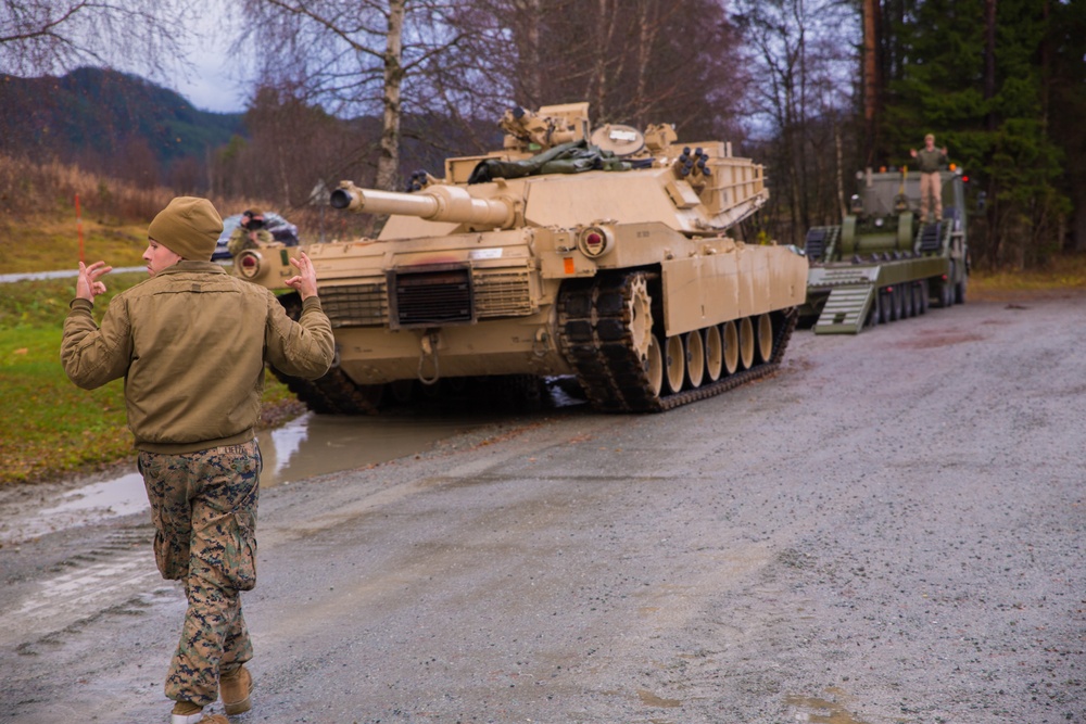 Marines drive M1A1 Abrams tanks