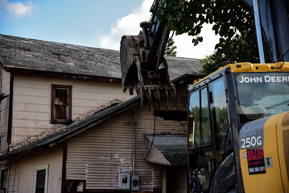 Excavator knocks down Harlingen drug house