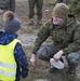U.S. Marines interact with Norwegian children during Trident Juncture 18