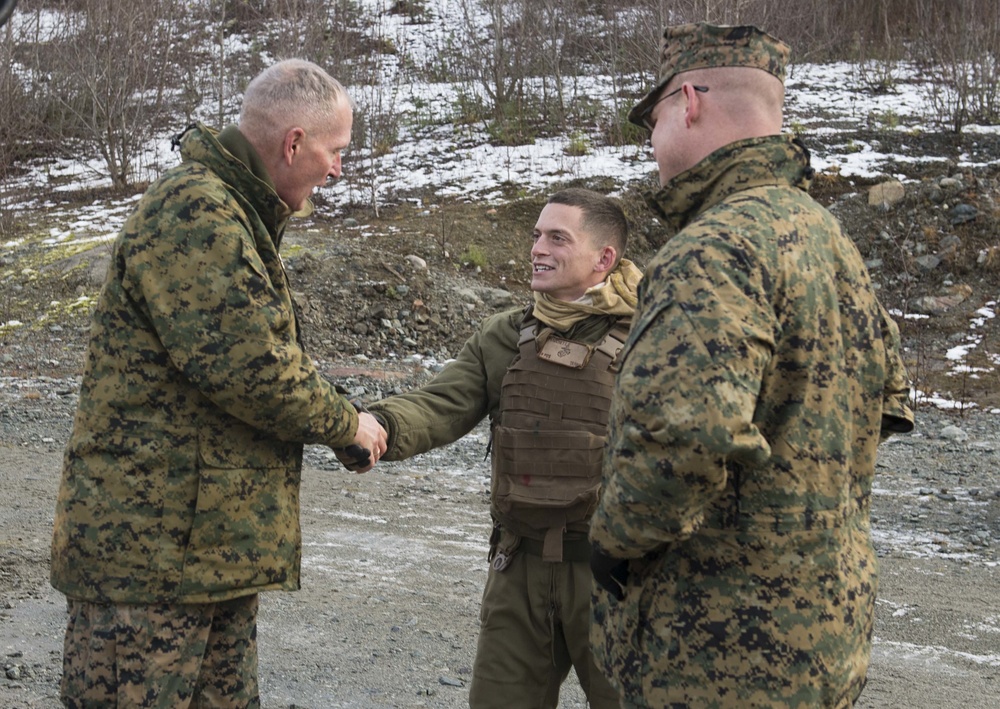 Lt. Gen. Mark A. Brilakis visits with U.S. Marines during Exercise Trident Juncture 18