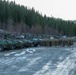 Marines with 2nd Light Armored Reconnaissance prepare snow camouflage