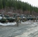 Marines with 2nd Light Armored Reconnaissance prepare snow camouflage