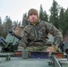 Marines with 2nd Light Armored Reconnaissance prepare snow camouflage