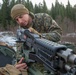 Marines with 2nd Light Armored Reconnaissance prepare snow camouflage