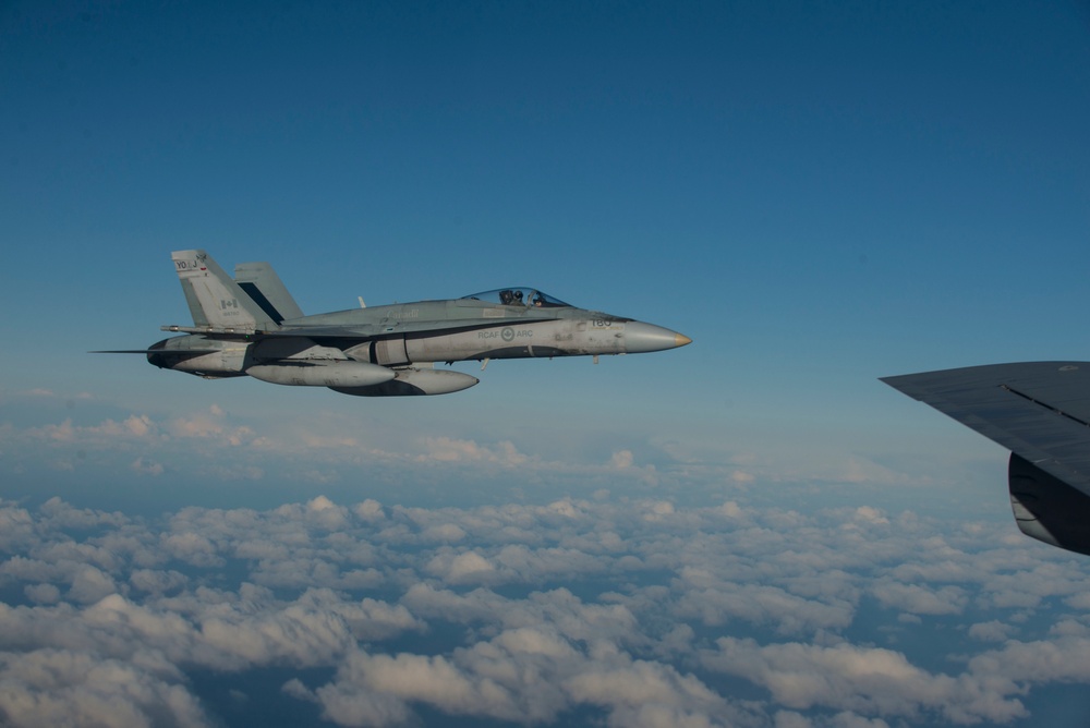 A Bloody Hundredth KC-135 refuels Finnish, Canadian F-18s for Exercise Trident Juncture 18