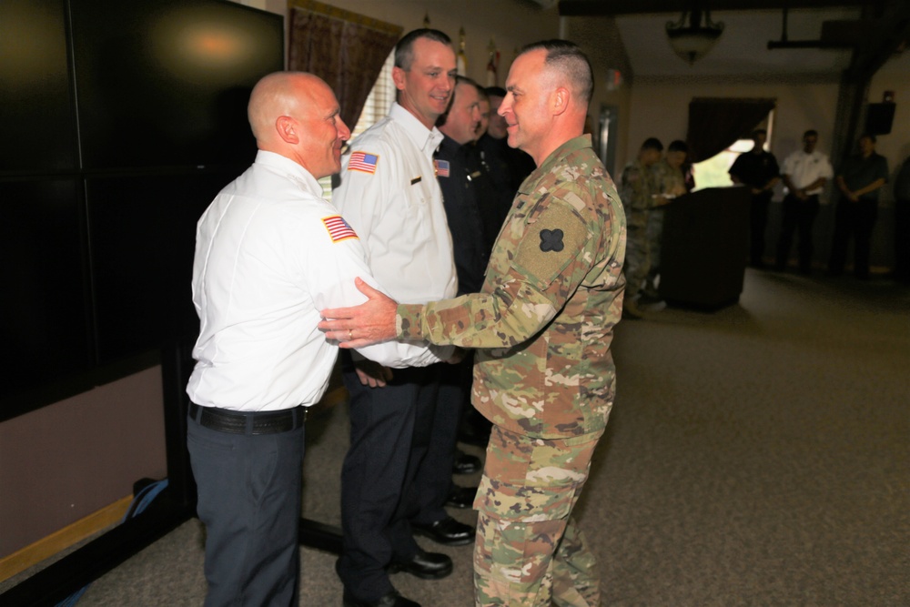 Fort McCoy members presented with 2-star commander's coin during ceremony