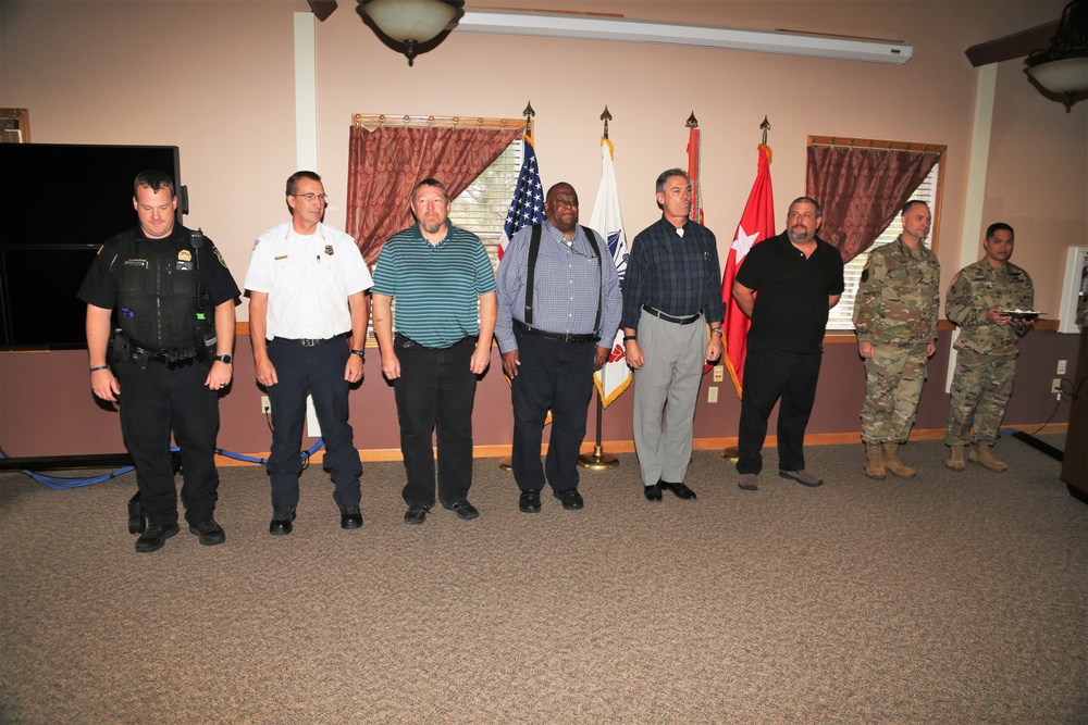 Fort McCoy members presented with 2-star commander's coin during ceremony