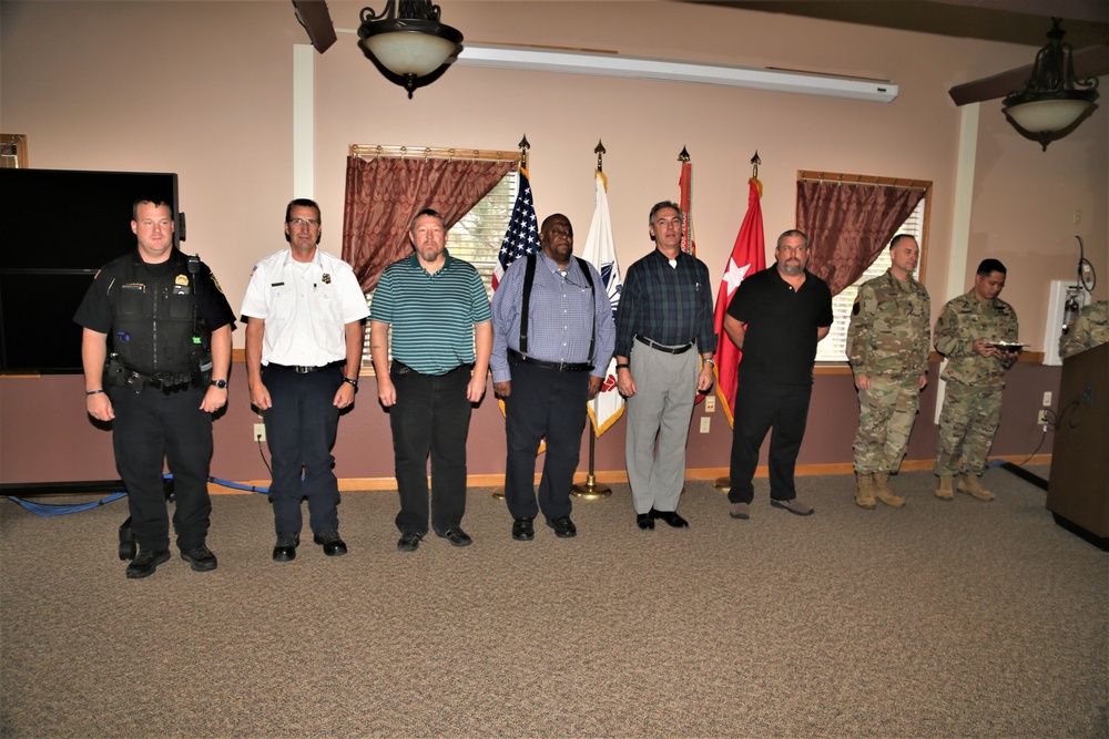 Fort McCoy members presented with 2-star commander's coin during ceremony