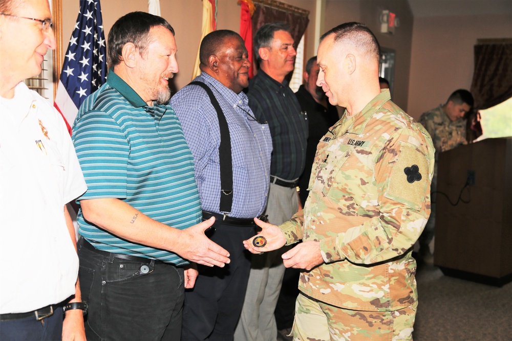 Fort McCoy members presented with 2-star commander's coin during ceremony