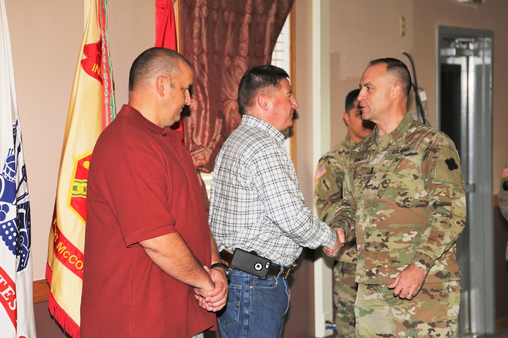 Fort McCoy members presented with 2-star commander's coin during ceremony