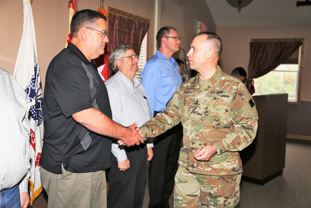 Fort McCoy members presented with 2-star commander's coin during ceremony