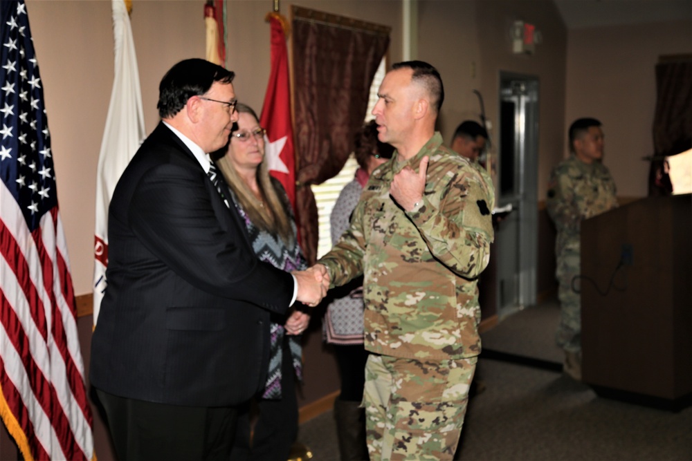 Fort McCoy members presented with 2-star commander's coin during ceremony