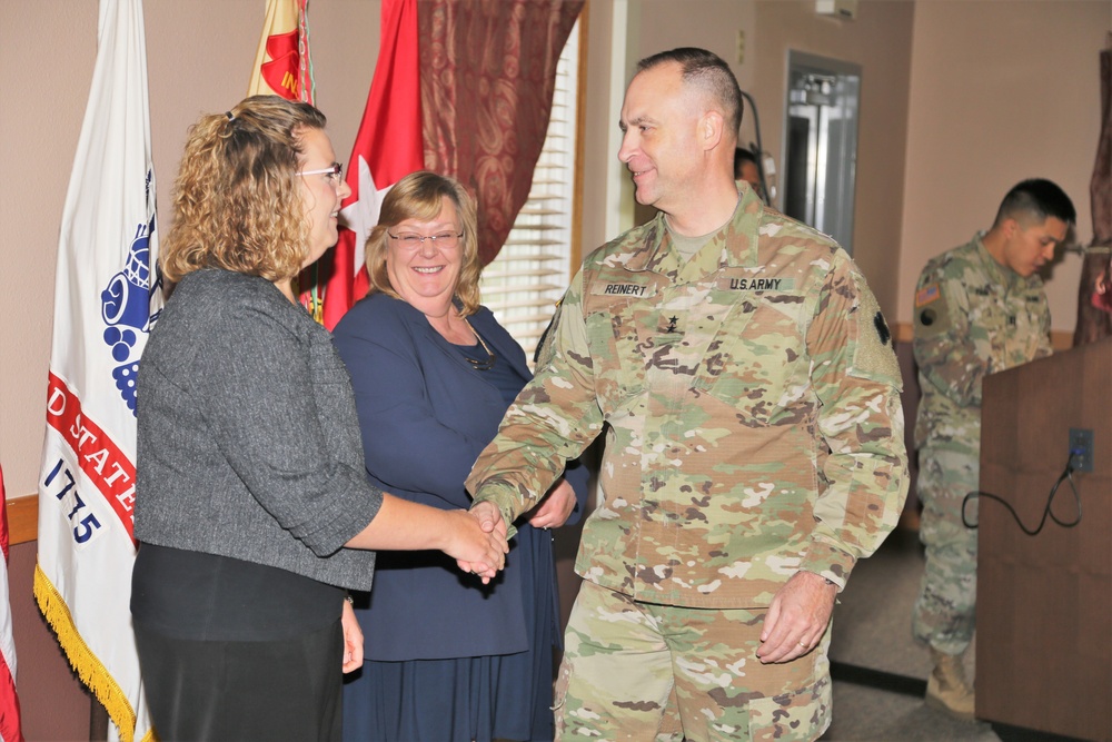 Fort McCoy members presented with 2-star commander's coin during ceremony