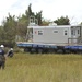 Emergency Support Function-10 Unified Command works to remove a displaced houseboat from the Rachel Carson Reserve, N.C.