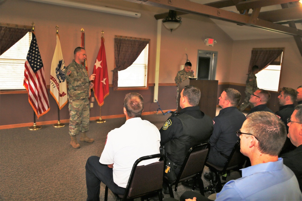 Fort McCoy members presented with 2-star commander's coin during ceremony