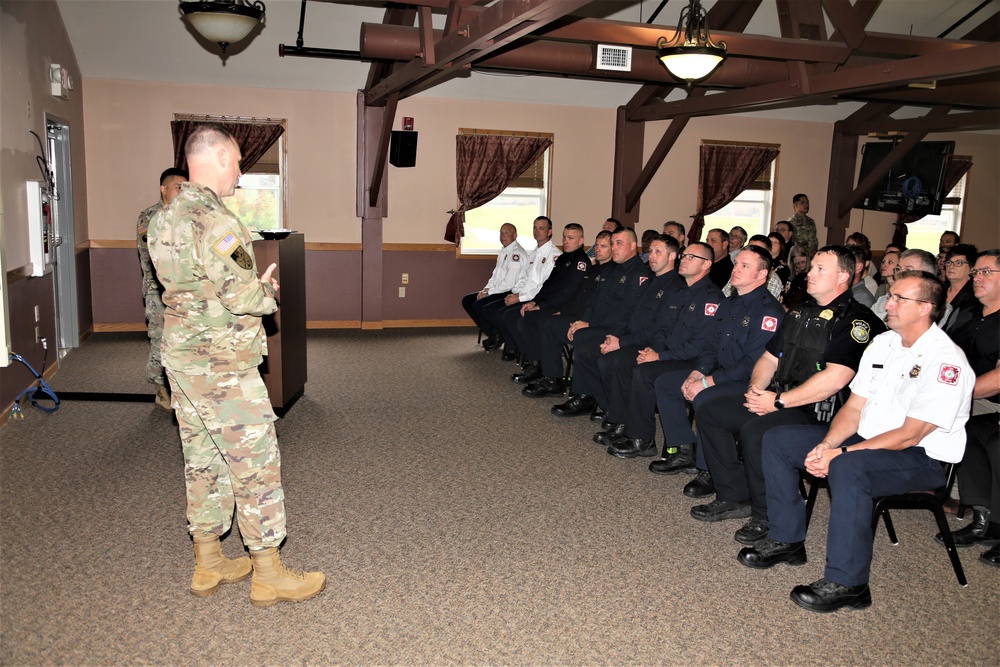 Fort McCoy members presented with 2-star commander's coin during ceremony