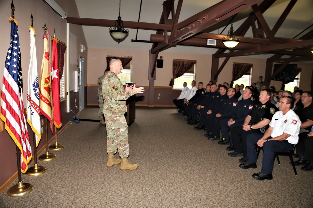 Fort McCoy members presented with 2-star commander's coin during ceremony