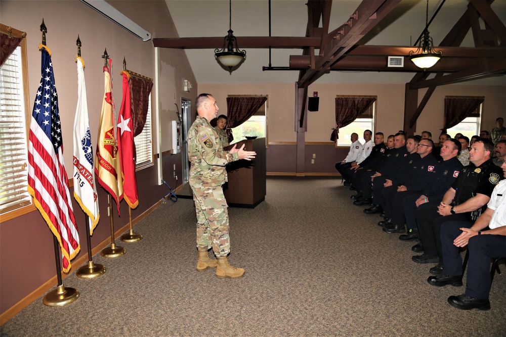 Fort McCoy members presented with 2-star commander's coin during ceremony