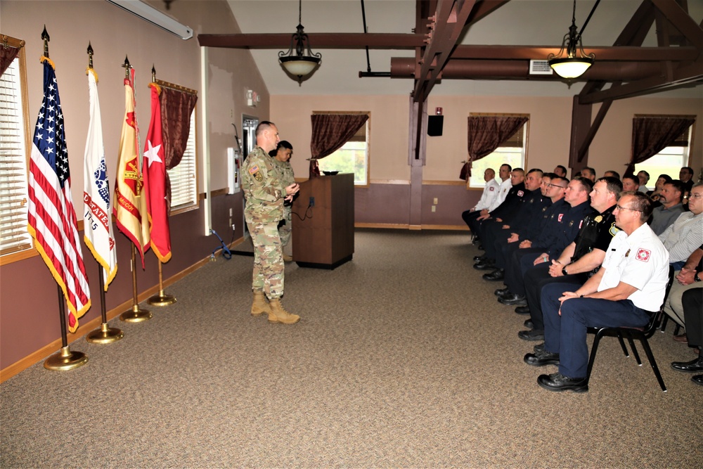 Fort McCoy members presented with 2-star commander's coin during ceremony