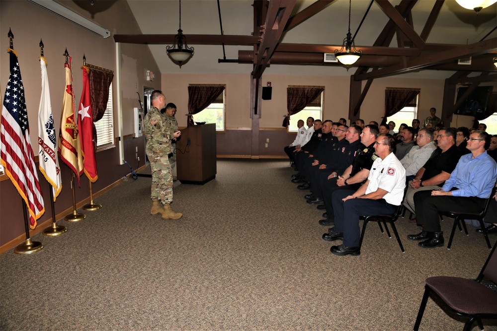 Fort McCoy members presented with 2-star commander's coin during ceremony