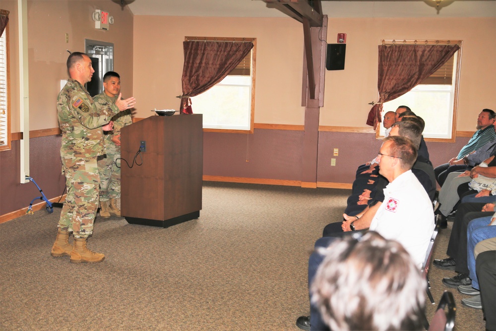 Fort McCoy members presented with 2-star commander's coin during ceremony