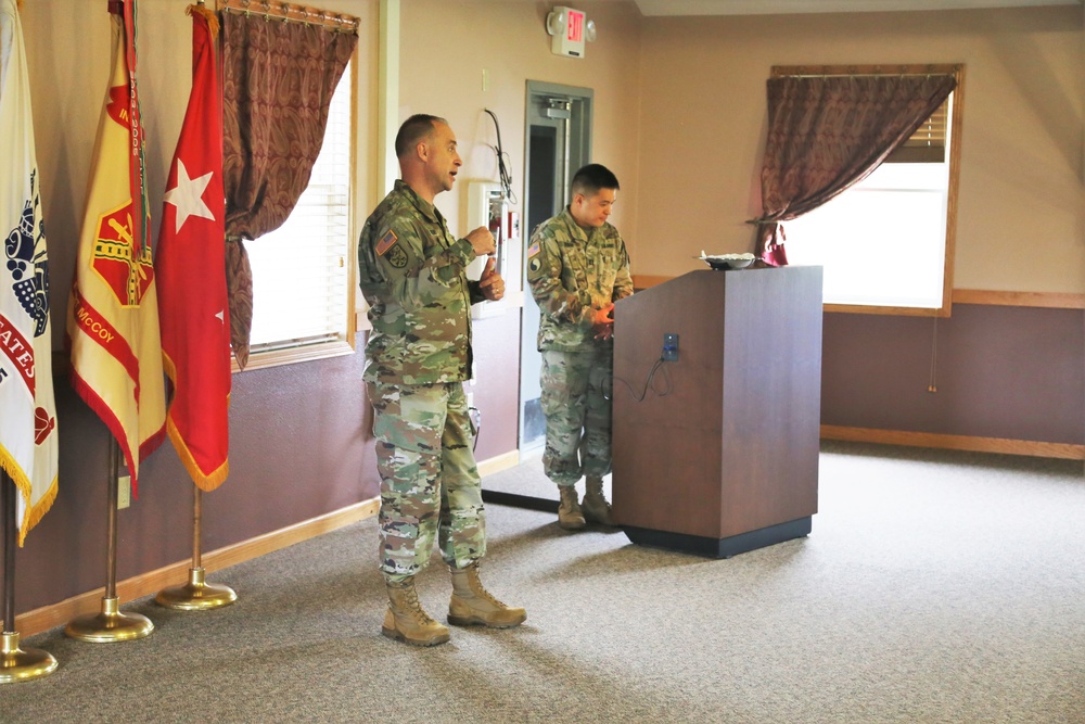 Fort McCoy members presented with 2-star commander's coin during ceremony