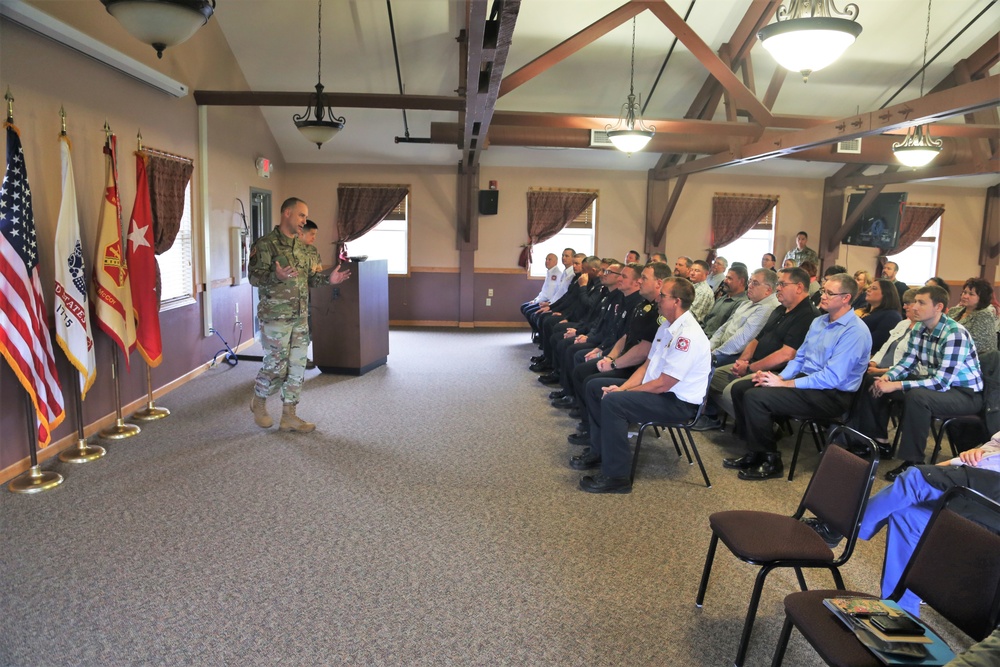 Fort McCoy members presented with 2-star commander's coin during ceremony