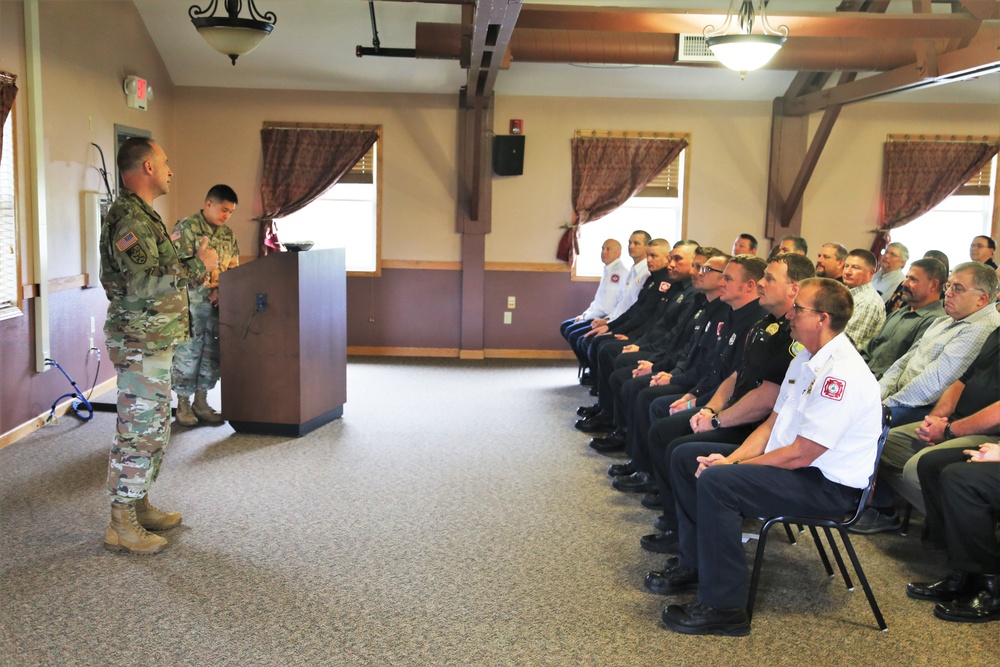 Fort McCoy members presented with 2-star commander's coin during ceremony