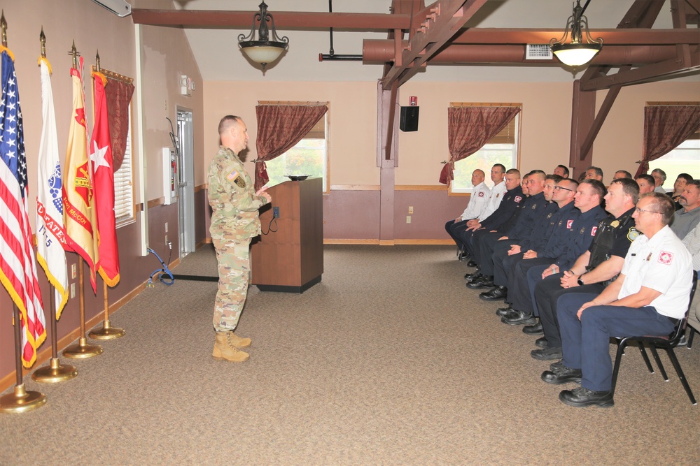 Fort McCoy members presented with 2-star commander's coin during ceremony