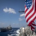 The Ticonderoga-class guided-missile cruiser USS Chancellorsville (CG 62) finishes a replenishment-at-sea with the Military Sealift Command fleet replenishment oiler USNS Tippecanoe (T-AO 199)