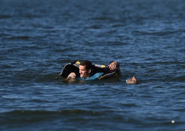 Coast Guard Station Cape Charles crew demonstrates cold water survival in Cape Charles, Va.
