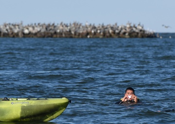 Coast Guard Station Cape Charles crew demonstrates cold water survival in Cape Charles, Va.