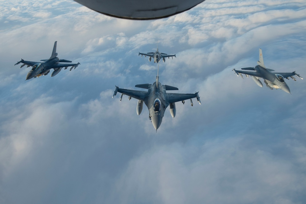 Belgian F-16s fly in formation during Exercise Trident Juncture 18