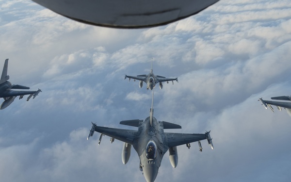 Belgian F-16s fly in formation during Exercise Trident Juncture 18