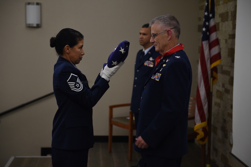 Col. Larry Warmoth, a flight doctor with 149th Medical Group, retirement