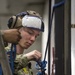 Sailors repair ship's christening seal