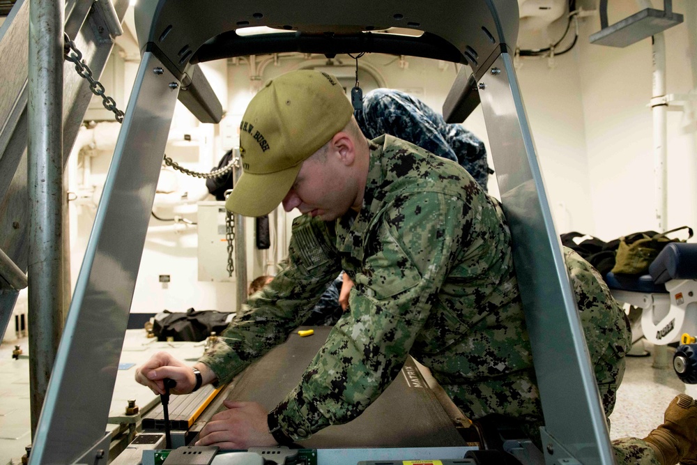 Sailor Conducts Maintenance