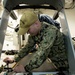 Sailor Conducts Maintenance