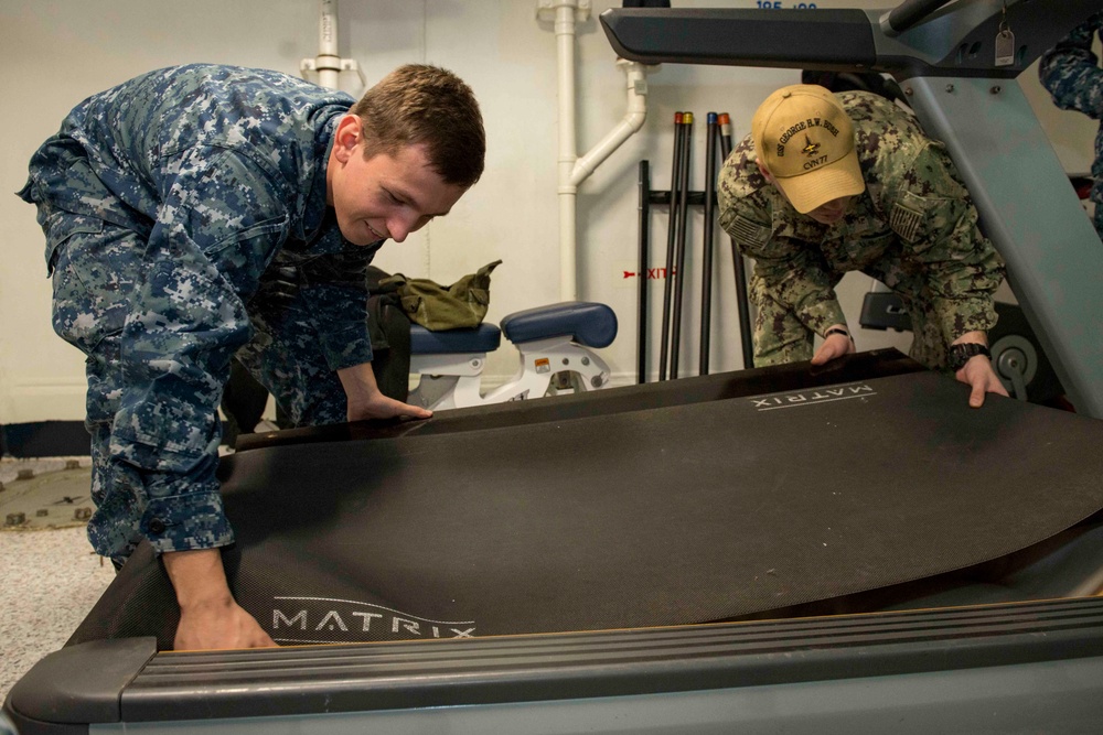 Sailor Conducts Maintenance