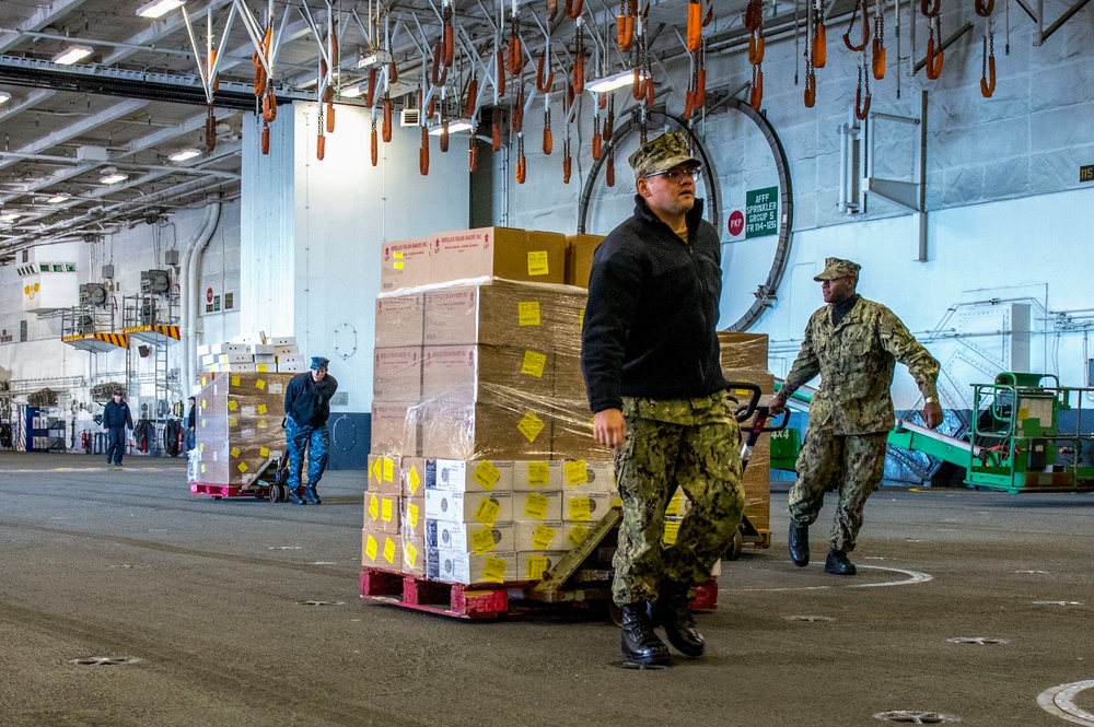 Sailors Move Supplies