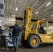 Sailors Move Arresting Gear Wire Spool