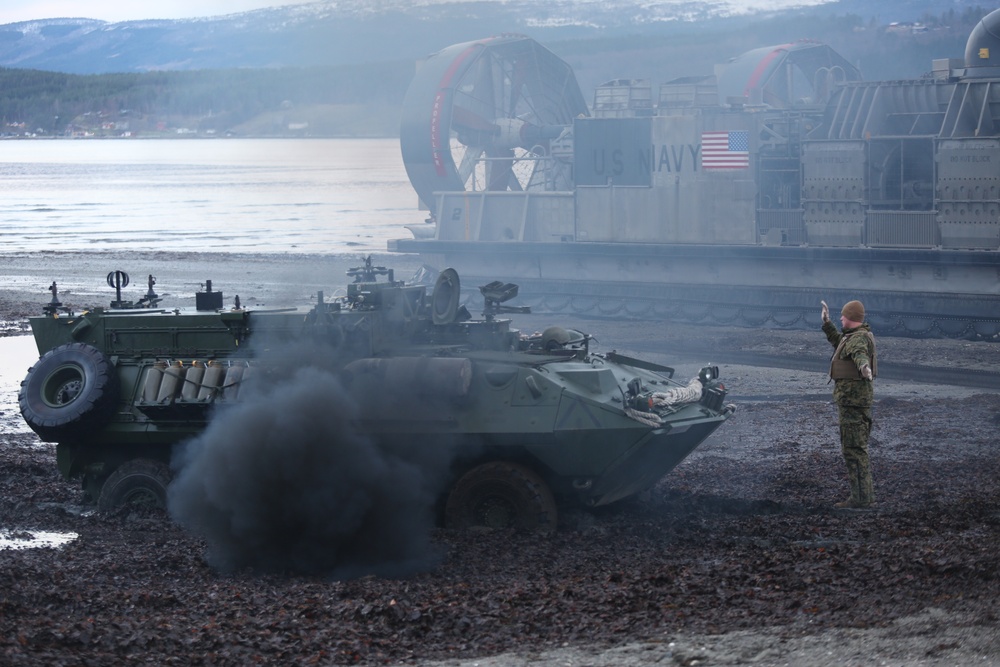 U.S. Marines and Sailors attack the beach during Trident juncture 2018