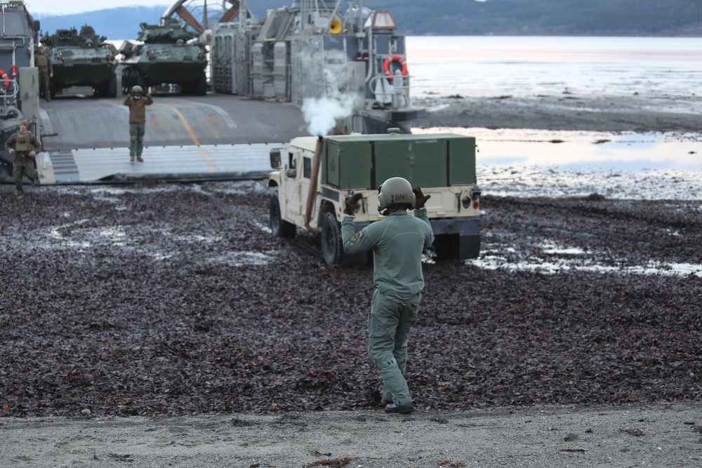 U.S. Marines and Sailors attack the beach during Trident juncture 2018