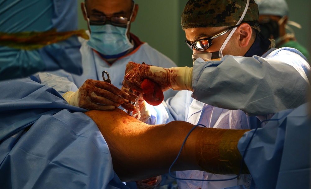 USNS Comfort Personnel Preform Surgery on Patients
