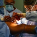 USNS Comfort Personnel Preform Surgery on Patients