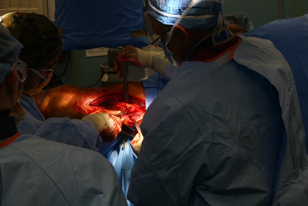 USNS Comfort Personnel Preform Surgery on Patients
